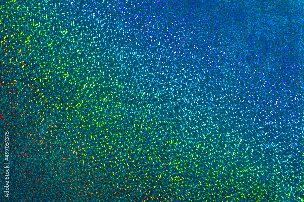 Blue glitter with holographic sparkle background texture. Millennial