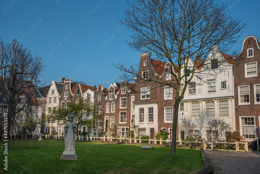 Amsterdam, Netherlands, March 2022. The beguinage in Amsterdam with historic facades.