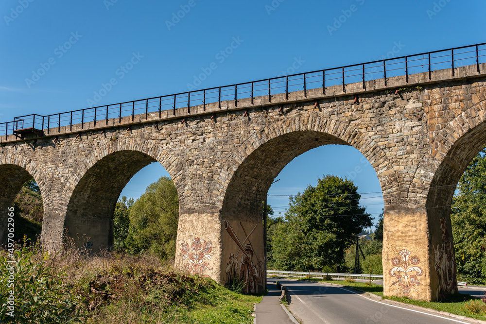 Fototapeta premium A big, old, ancient aqueduct bridge in the mountains