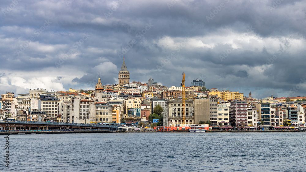 View from the sea on the historic part of Istanbul with the Galata Tower