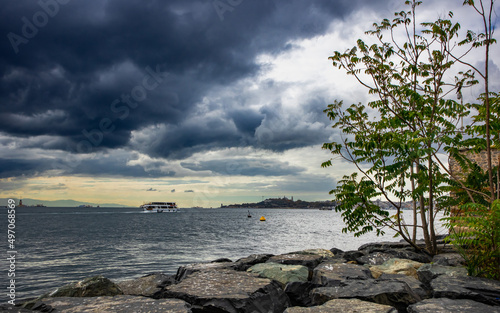 Panorama of the Bosphorus with dramatic sky at sunset photo