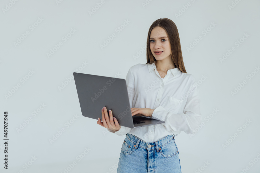 Successful business woman is standing on isolated on white background. Successful business woman is standing on isolated on white background.