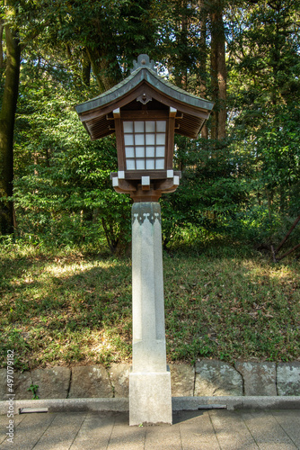Japanese traditional  lantern, called 'Toro' in a park on the way to a Shinto Shrine in Shibuya, Tokyo, Japan