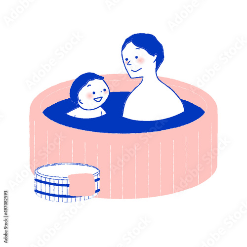 温泉に入浴する親子
