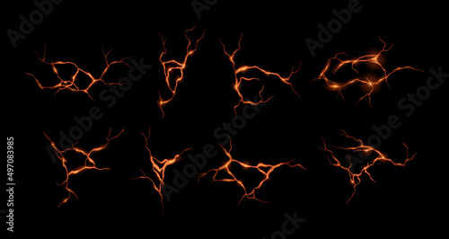 Ground cracks with orange lava light inside. Vector realistic set of volcano magma, thunderbolt, flaming cracks in the ground, neon fissure, earthquake. Top view. Land destruction texture. photo
