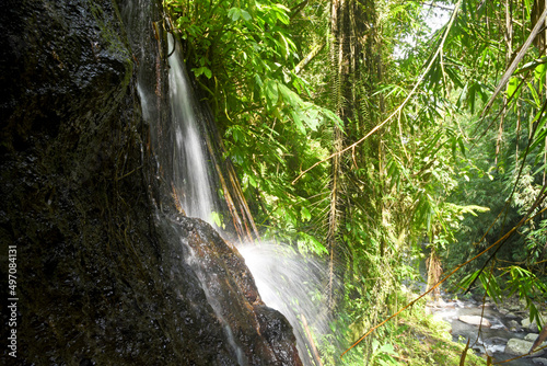 Small waterfall and serround at Babahan village in Tabanan regency of Bali Indonesia with smooth clear water