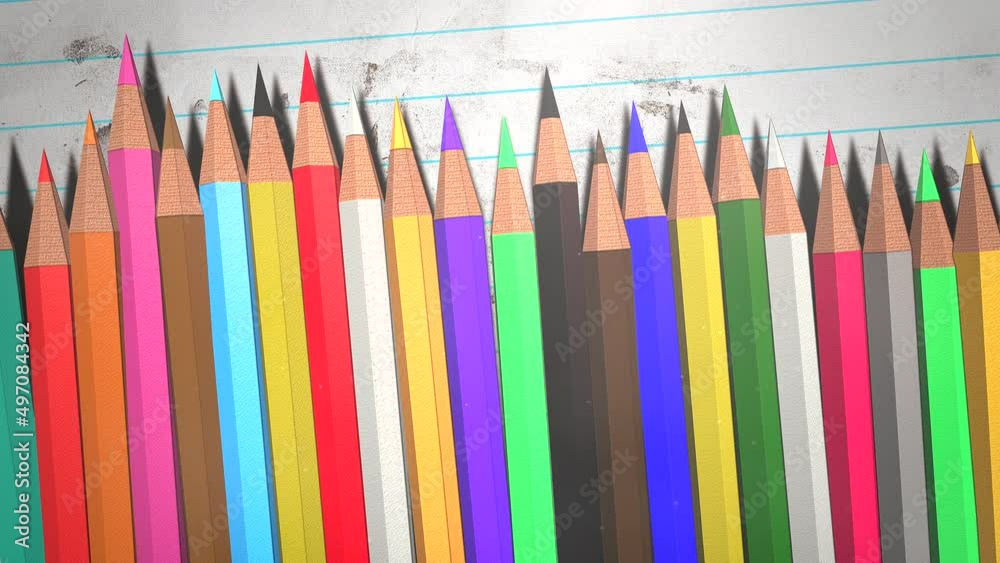 Colorful pencils on paper, motion school and kids style background Colorful pencils on paper, motion school and kids style background