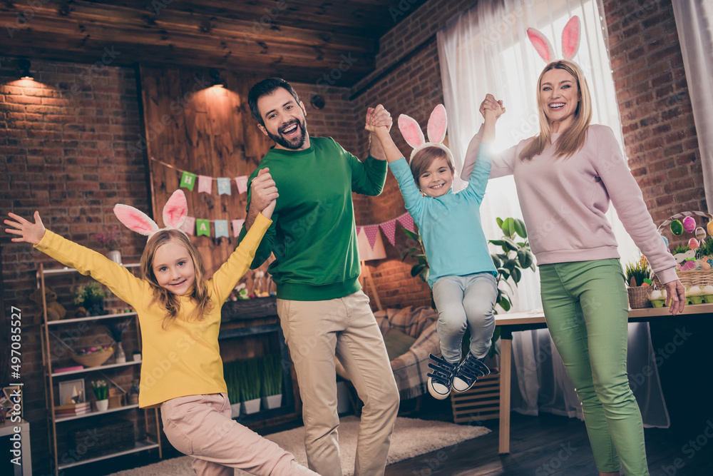 Fototapeta premium Portrait of attractive adorable cheerful big full family dancing having fun easter domestic party event occasion indoors