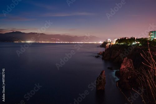 Beautiful night landscape with city on the seashore. Antalya  Turkey.