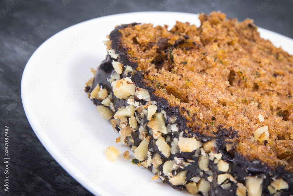 Pieces of zucchini dough with nuts and raisins Pieces of zucchini dough with nuts and raisins