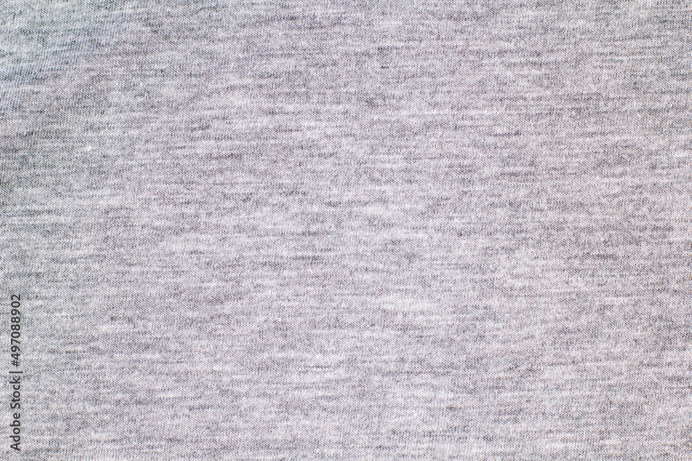 Grey knitted fabric cotton textured background. Closeup with copy space for your design Grey knitted fabric cotton textured background. Closeup with copy space for your design