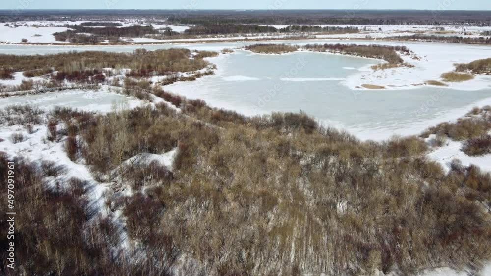 Video of winter landscape near the river during dron fly