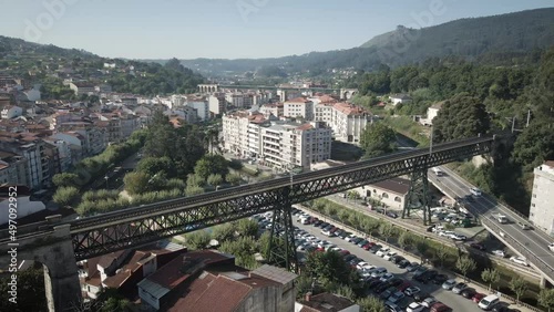 Aerial of Redondela city with the train bridge on a sunny summer day in Pontevedra, Galicia photo