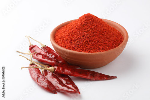 Fototapeta Naklejka Na Ścianę i Meble -  Indian spice Red chilli powder in white ceramic bowl