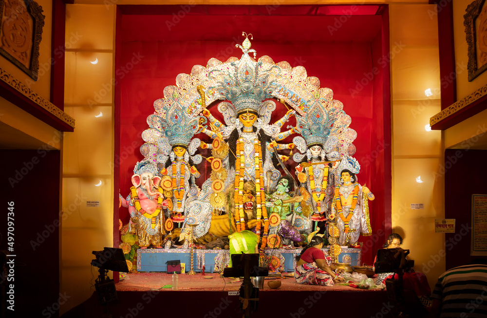 Kolkata, India - October 16, 2018 : Night image of decorated Durga Puja pandal, shot at colored light, at Kolkata, West Bengal, India. Durga Puja is biggest religious festival of Hinduism.