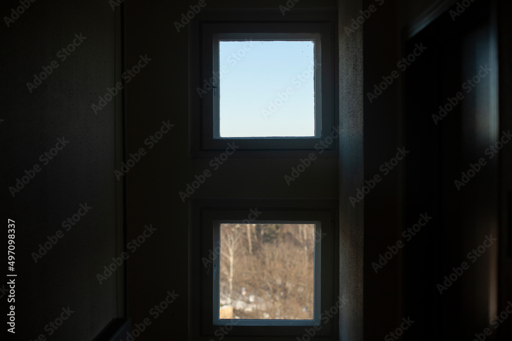 Two windows. Window opening inside house. Different view through glass. Two windows. Window opening inside house. Different view through glass.
