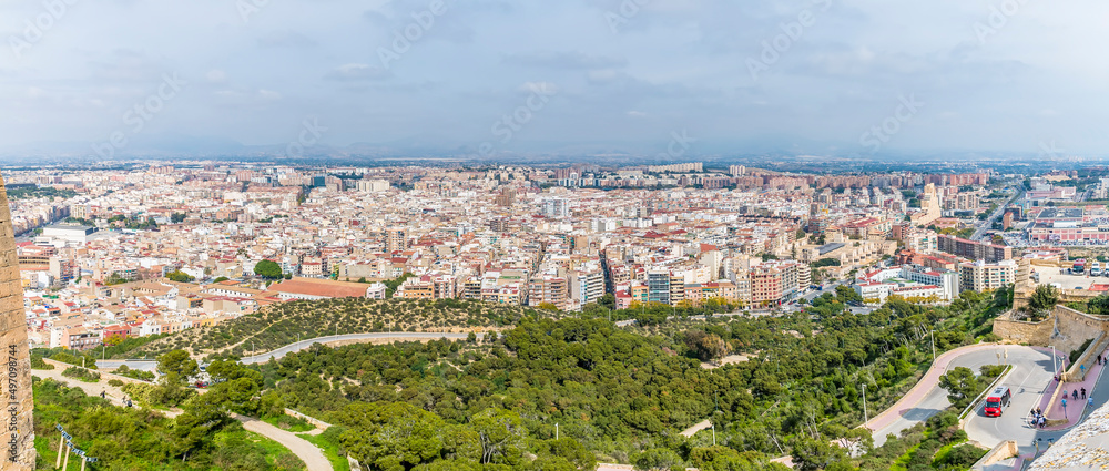 Obraz premium A panorama view from the castle of Saint Ferran westwards at Alicante on a spring day