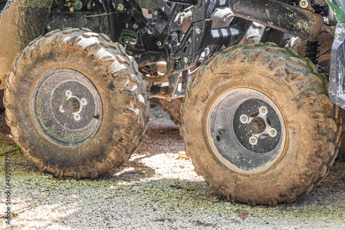 Dirty wheels and tires from quads in jungle Mexico.