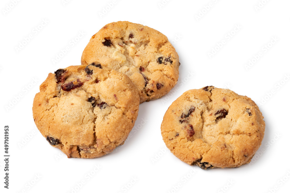 Heap of fresh baked chocolate cranberry cookie close up isolated on white background Heap of fresh baked chocolate cranberry cookie close up isolated on white background