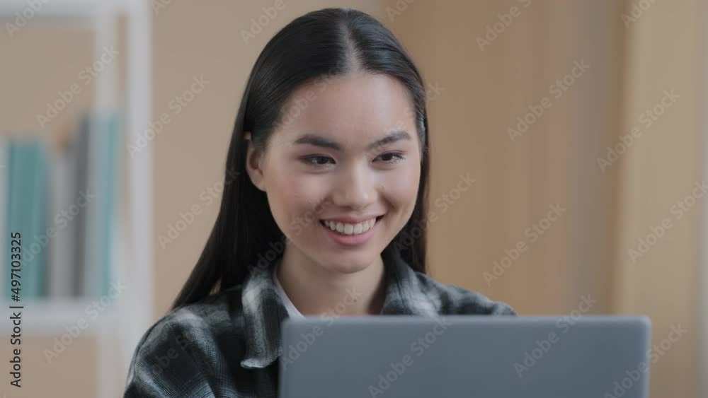 Portrait asian smiling satisfied girl user student freelancer buyer blogger business woman 20s lady looking at laptop screen sincere smile using computer application service website chatting browsing Portrait asian smiling satisfied girl user student freelancer buyer blogger business woman 20s lady looking at laptop screen sincere smile using computer application service website chatting browsing