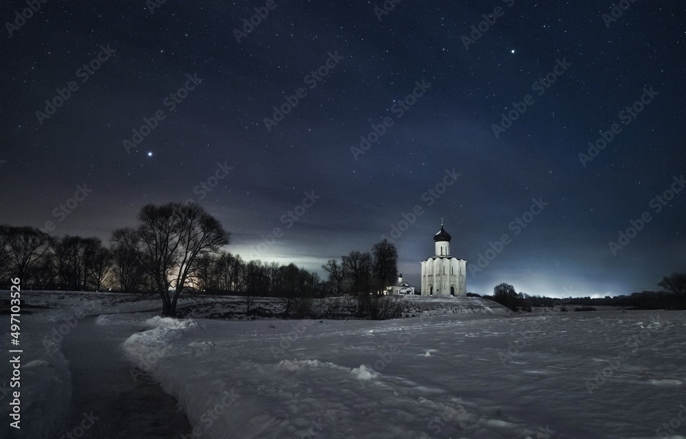 church in winter on the background of the night sky
