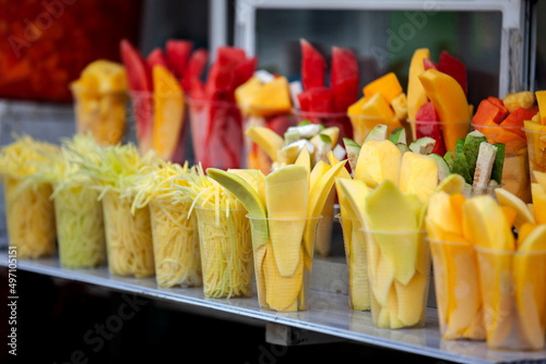 Fototapeta Naklejka Na Ścianę i Meble -  Street sell of mango and other fruits at the beautiful streets of Salento an small town located at the Quindio region in Colombia