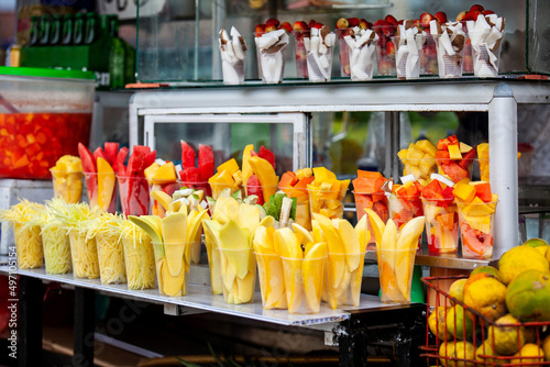 Fototapeta Naklejka Na Ścianę i Meble -  Street sell of mango and other fruits at the beautiful streets of Salento an small town located at the Quindio region in Colombia