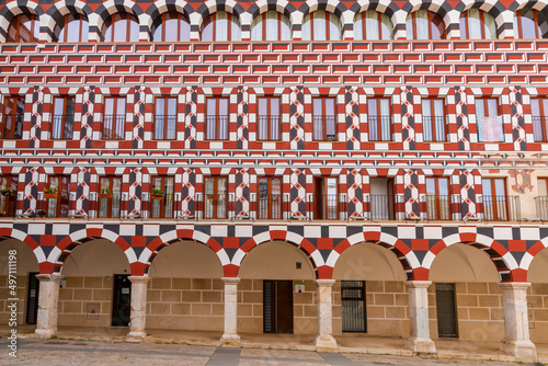 brightly colored portico and building of the University of Extremadura