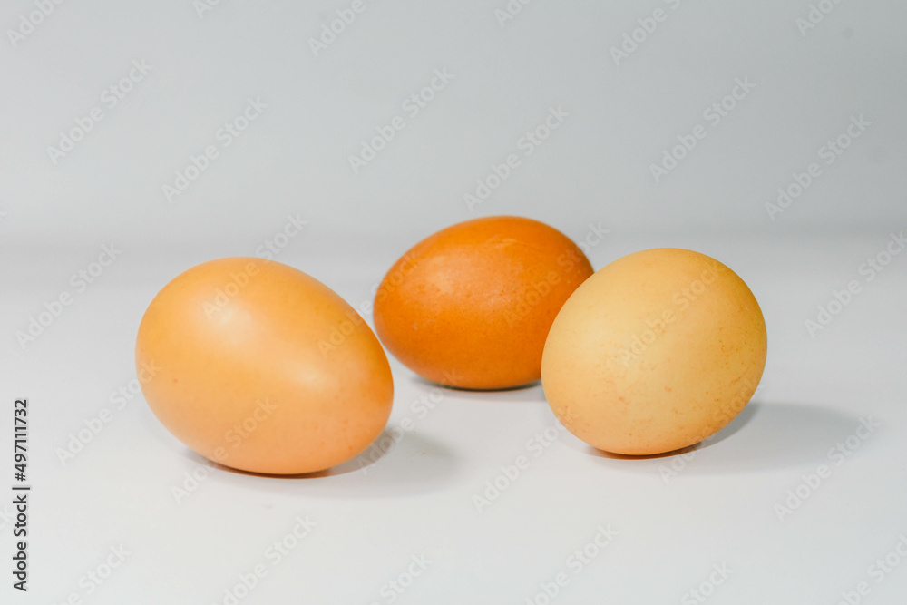 eggs isolated on a cutting board white background ,several eggs. eggs isolated on a cutting board white background ,several eggs.