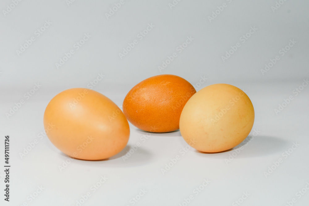 eggs isolated on a cutting board white background ,several eggs. eggs isolated on a cutting board white background ,several eggs.