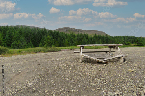 Broken bench in front of a moutain in Iceland © Marion
