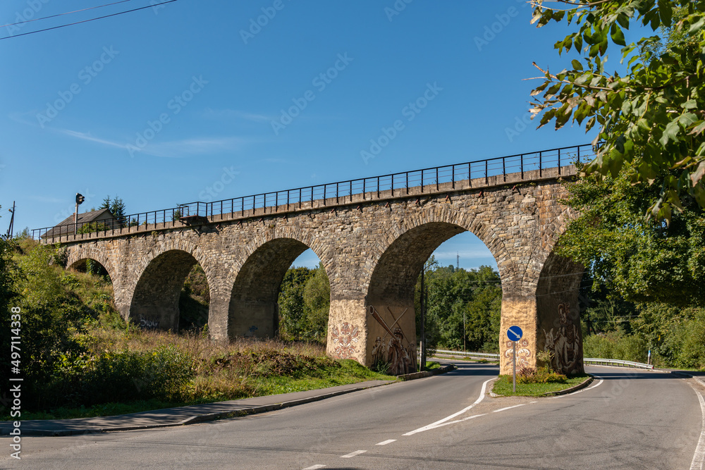 Vorokhta, Ukraine – September 24, 2021: A big, old, ancient aqueduct bridge in the mountains