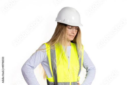 female architect wearing a hardhat