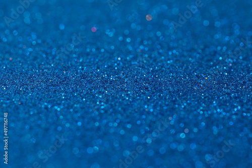 shiny blue background with blur, photo with depth of field in the middle, Metallic shimmers paper