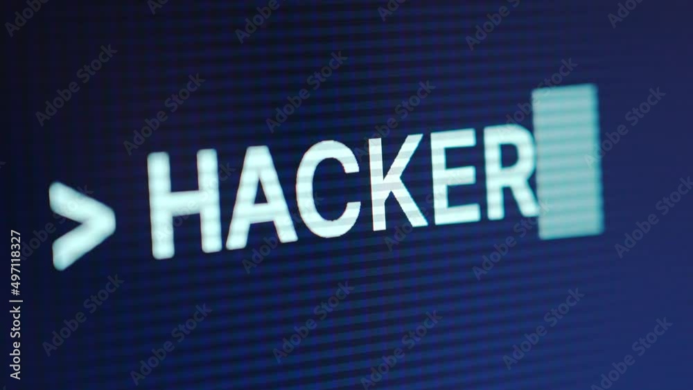 A close-up view of a computer user typing HACKER into a terminal window prompt. Looping.
