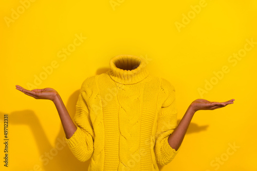 Conceptual photo image headless girl portrait raise two arms demonstrating novelty promotion no emotions just business isolated on yellow background photo