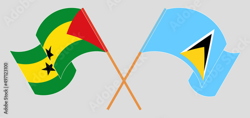 Crossed and waving flags of Sao Tome and Principe and Saint Lucia