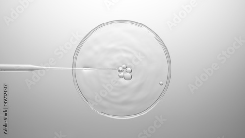 Air bubbles comes out from chemical dropper and floating on the surface of transparent fluid in petri dish, grayscale top view macro shot | Abstract cosmetics formulating concept