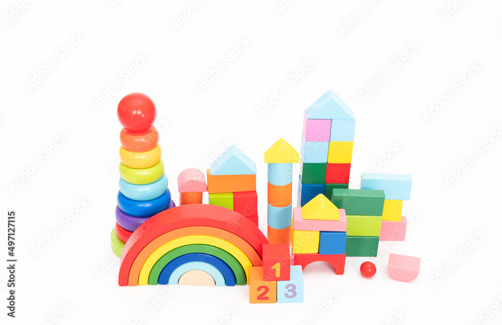 Children's toy wooden and colourfull toy shop isolated on white background. Educational toys. Children's toy wooden and colourfull toy shop isolated on white background. Educational toys.
