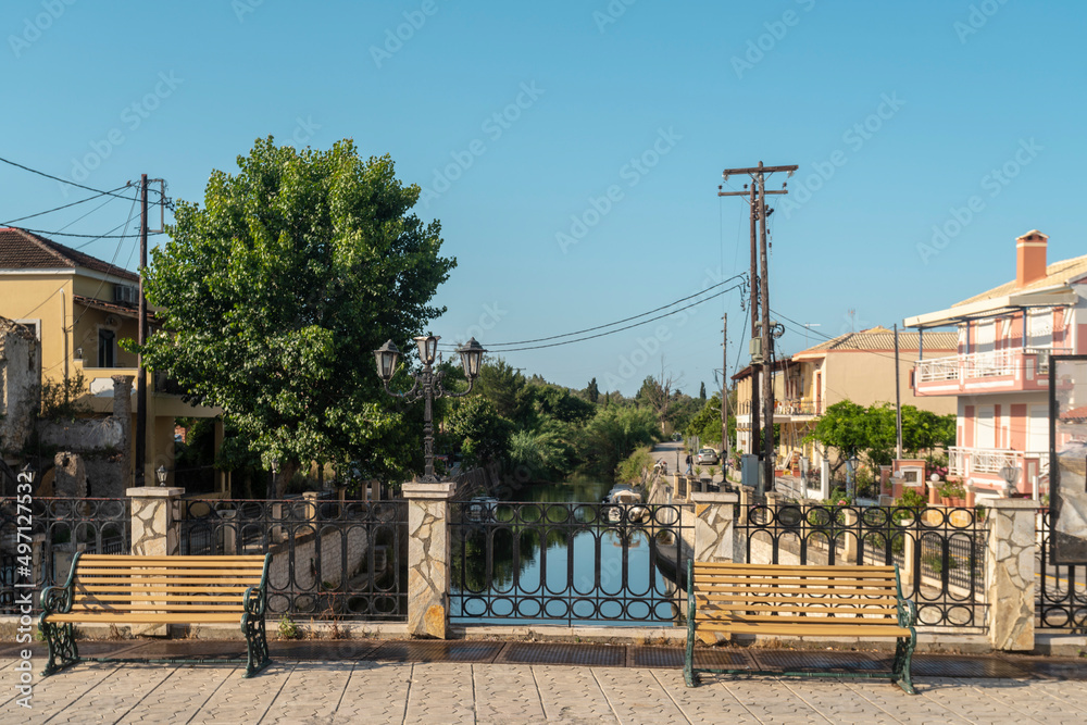 Greece, Lefkimmi, Benches on bridge over canal Greece, Lefkimmi, Benches on bridge over canal