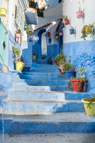 Morocco, Chefchaouen, Narrow alley and traditional blue houses © Image Source