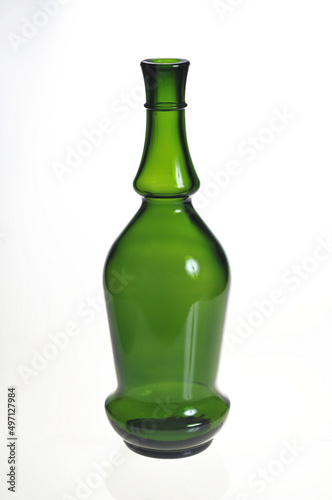Original green empty wine bottle isolated on a white background