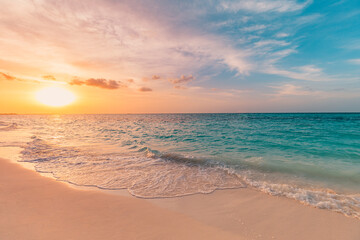 Closeup sea sand beach. Panoramic beach landscape. Inspire tropical beach seascape horizon. Orange and golden sunset sky calmness tranquil relaxing sunlight summer mood. Vacation travel holiday banner