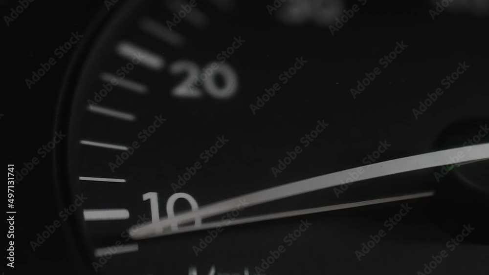 The white arrow of the tachometer moves along the dial when the accelerator is pressed The white arrow of the tachometer moves along the dial when the accelerator is pressed