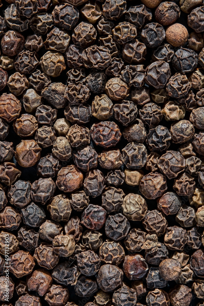 Black pepper, vertical frame, flat lay or mockup. Aromatic spices, screen wallpaper ideas Black pepper, vertical frame, flat lay or mockup. Aromatic spices, screen wallpaper ideas