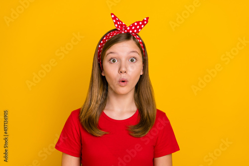 Canvas Print Photo of cute small girl look camera wear red t-shirt headband isolated on yello