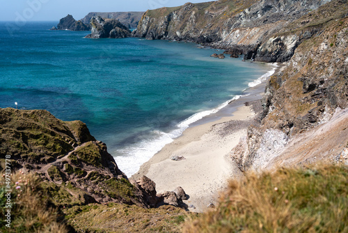 Cornwall coast with steep cliffs, beach and clear water in England, United Kingdom, beautiful hiking and biking trails for tourism and travel © Stanley Dullea