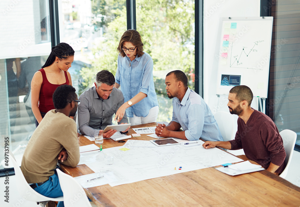 Brainstorming is easy if you have the right tool. Cropped shot of a group of architects in the boardroom. Brainstorming is easy if you have the right tool. Cropped shot of a group of architects in the boardroom.