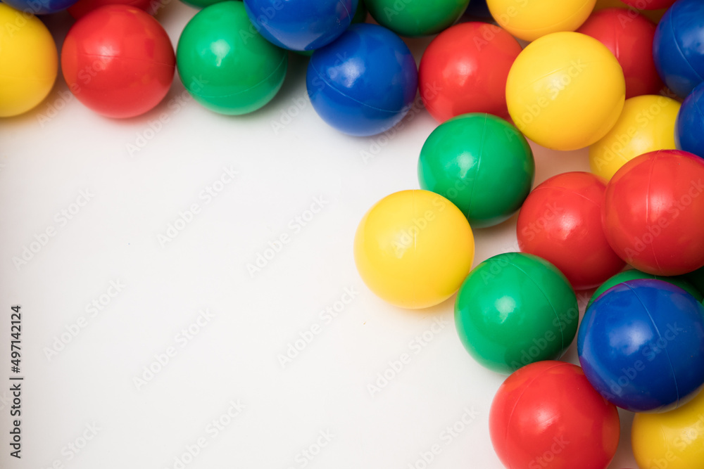 Multi-colored plastic balls. A children's balls isolated on white background. Multi-colored plastic balls. A children's balls isolated on white background.
