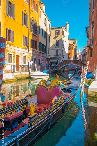 View of empty gondola on narrow canals of Venice, Italy